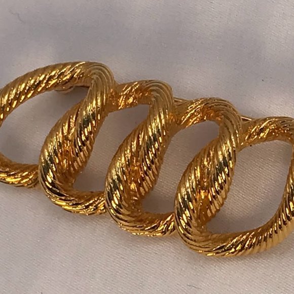 MONET Gold-tone Four Textured Rings Brooch - Picture 2 of 5